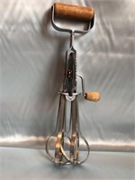 ANOTHER VINTAGE EGG BEATER WITH WOOD HANDLES IN