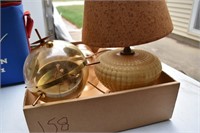 Poloroid camera, lamp, shades, clock/thermometer