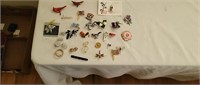 Assortment of brooches, pins and earrings