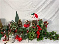 Lot of holiday wreaths and decor