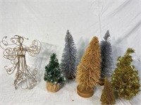 Holiday trees and angel figurine