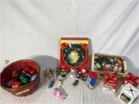 Holiday ornaments, wreath, and figurines
