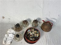 Antique glass base lanterns, assorted buttons,