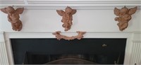 3 Terra cotta putto and wreath