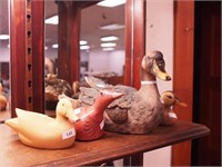 Four duck figurines, some wood,
