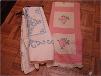 Two vintage hand-stitched quilts, white