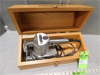 Porter Cable electric sander in a wooden storage c