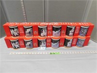 12 Collector Coca-Cola mugs in original packaging
