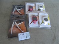 4 MUSEDO CLIP ON GUITAR TUNERS - 2 GUITAR CAPOS