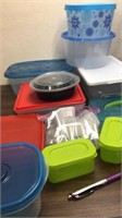Assortment Of Plastic Storage Containers With Lids