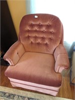 Upholstered swivel rocking chair
