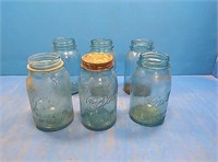 6 blue ball jars 1 with a lid