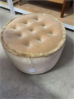 ROUND UPHOLSTERED OTTOMAN