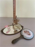 Small dresser tray, perfume bottles, hand mirror