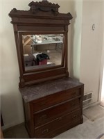 Eastlake marble top dresser with ornate mirror