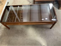 MID CENTURY COFFEE TABLE WITH SMOKED GLASS