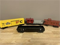 4 assorted Lionel cars