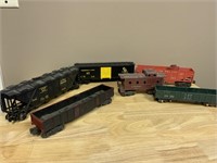 Six assorted Lionel cars