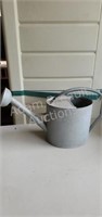 Large galvanized flower watering can