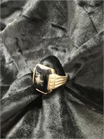 10 karat gold ring with black stone, size 13