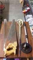 measuring wheel, paint stirring,  2 saws