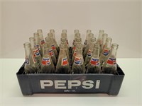 Vintage Pepsi bottles with tray