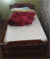 Twin bed with frame, bedding