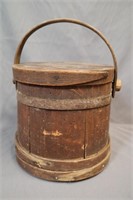 Old wooden firkin with lid