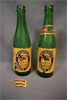 Pair of Moosehead paper label bottles