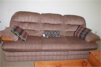 Sofa with two throw pillows