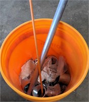 Bucket of metal pipes and construction