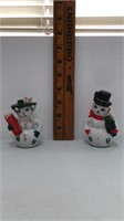 Snow man and woman salt and pepper shakers