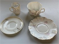 2 pairs of cups and saucers