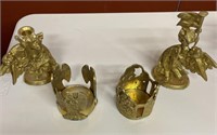 4 solid brass candle holders