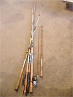 SEVERAL FISHING POLES, 1 W/ REEL