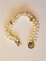 211- 7" Pearl Bracelet With 14K Gold