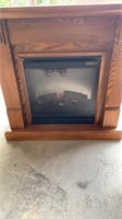 Electric fireplace, wooden,  37in x 14in x 37in.