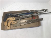 Assortment of handsaws and replacement blades.