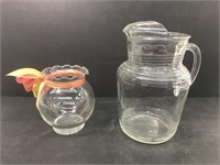 Vintage glass pitcher with bowl. Pitcher has