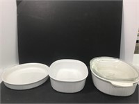 Three ovenproof casserole/baking dishes. One is