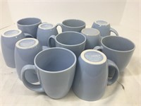 Eleven Corelle stoneware mugs.