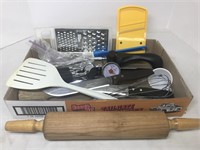 Assortment of kitchen items. Includes graters,
