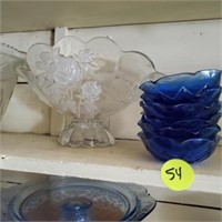 ROSE FRUIT BOWL AND BLUE DISHES