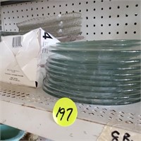 SHELF OF CLEAR GLASS PLATES - ASSORTED SIZES