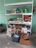 Contents on + In Front Of White Shelves in Garage