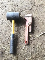 Rubber mallet and rigid pipe wrench