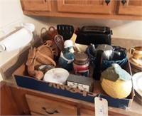 Box lot of goodies, toaster and basket.