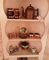 Contents  of three shelves; Copper items and more.