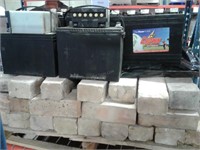 Pallet of Batteries and Stone Blocks
