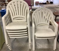 7 Plastic Stacking Chairs